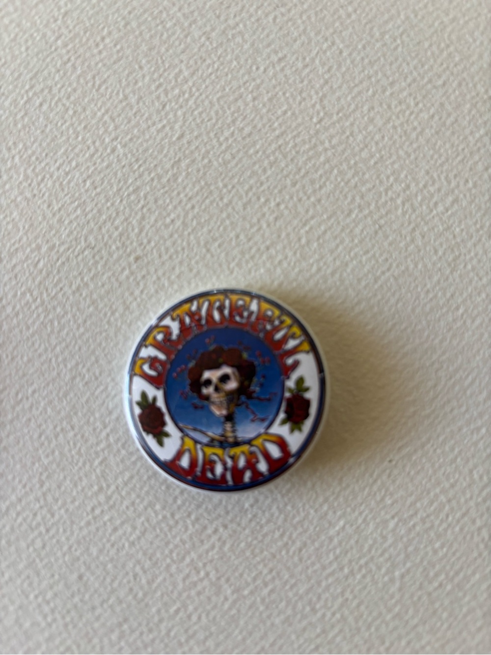 Grateful Dead Skull & Roses Round Pin - Blue, White, Red, Yellow